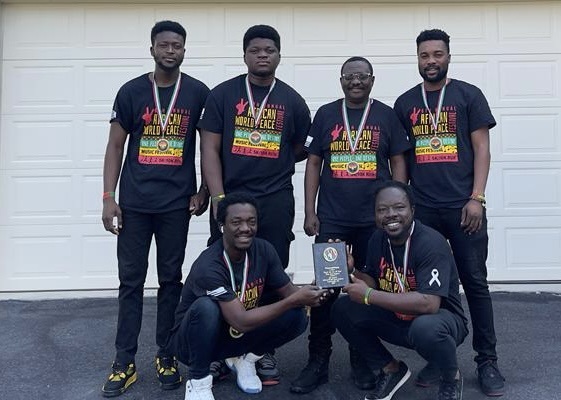 The Wazumbians  with the medals and plaque they earned in North Carolina 